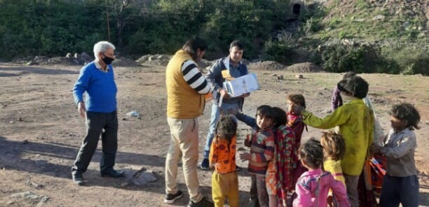 social worker distributing ration